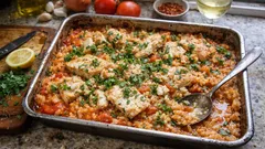 Arroz de peixe no tabuleiro: suculento no forno e sem estar sempre ao lume