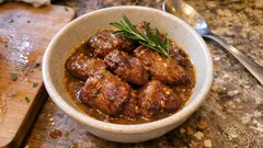 Bochechas de porco com cerveja e alecrim: ficam mesmo tenras em lume brando