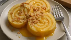 Torta enrolada de Aveiro com doce de ovos e amêndoa tostada (fofa e húmida)