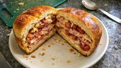 Folar transmontano recheado: massa fofa e camadas de enchidos, perfeito para a Páscoa