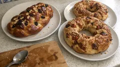 Uma massa, duas ideias festivas: trança de frutos secos e bolo-rei de enchidos